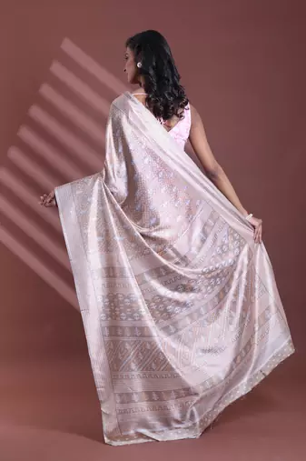Ecru silk soft saree with texture print