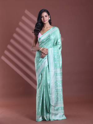 Light green silk soft saree with texture print 1