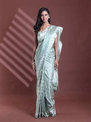 Mint green silk soft saree with abstract print 1