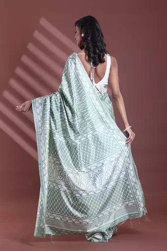 Mint green silk soft saree with abstract print