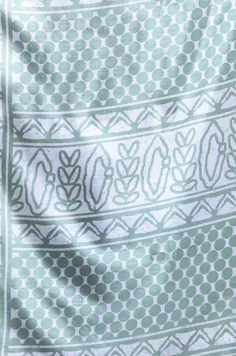 Mint green silk soft saree with abstract print