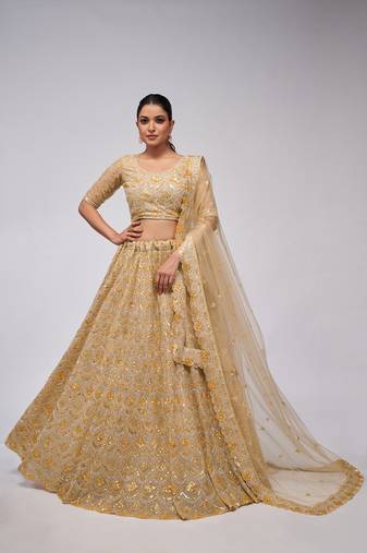 CHAMPAGNE GOLD NET EMBROIDERED LEHENGA CHOLI SET