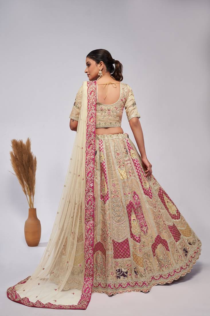 White Embroidered Net Lehenga Choli Set With Dupatta