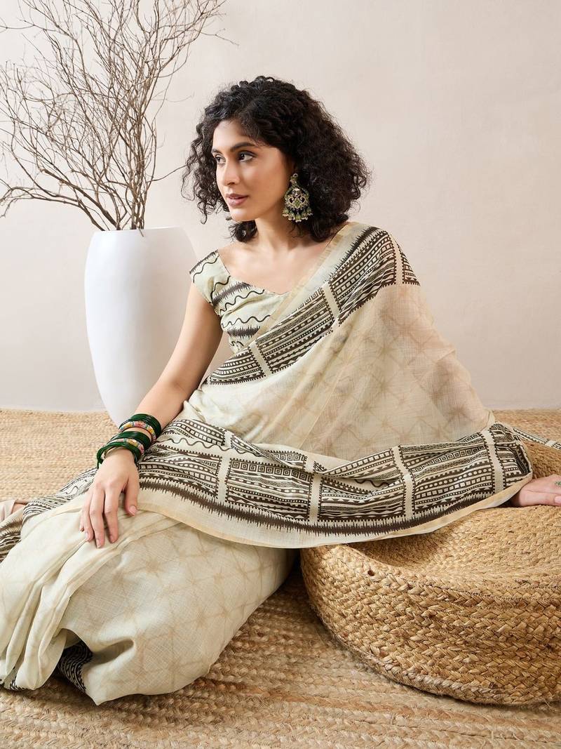 women off white linen blend geometric printed saree