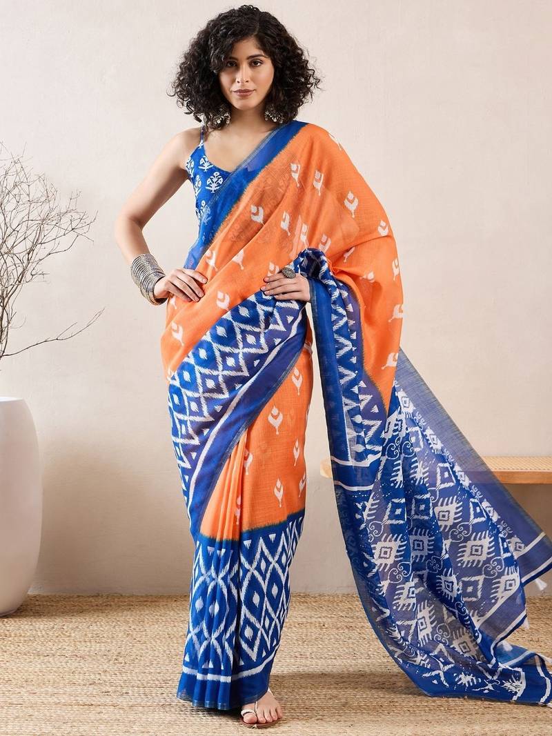 women orange linen blend ikat printed saree