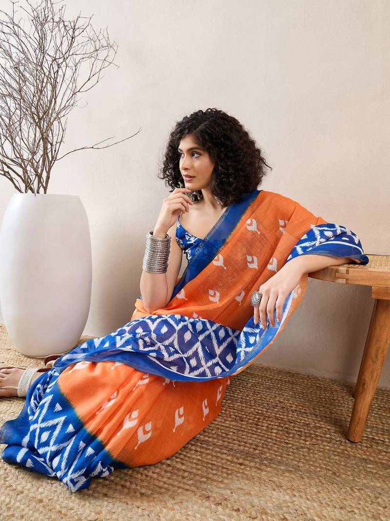 women orange linen blend ikat printed saree