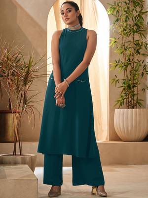 Teal blue halter neck kurta and culottes set with front pocket 2