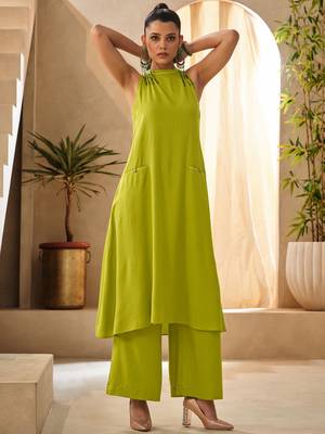 Green halter neck kurta and culottes set with front pocket 4
