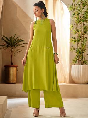 Green halter neck kurta and culottes set with front pocket 5