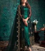 Dark green net embroidered trendy salwar kameez with shrug