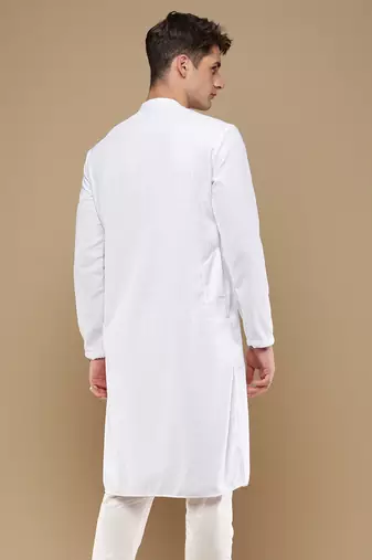 Unleash your style with men's white chikankari designer kurta by sanwara