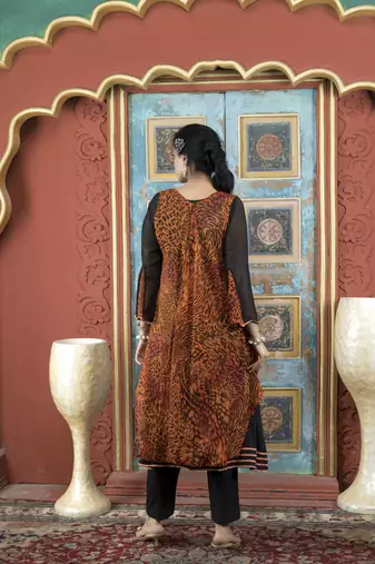 Nikhaar orange embroidered georgette asymmetrical kurta & pants set