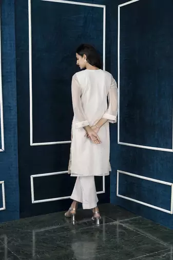 Nikhaar beige embroidered net straight cut kurta & palazzo set