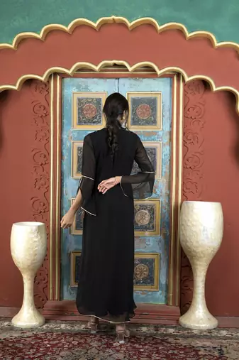 Nikhaar black embroidered georgette asymmetrical kurta & pants set