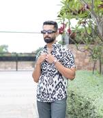 Off white floral half sleeve printed shirt