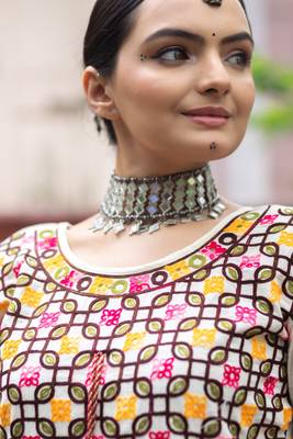 Off-white embroidered Navratri kedia with off-white tulip pant. Elegant outfit for Navratri festival. 4