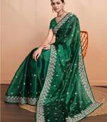 green organza woven saree with unstitched blouse piece