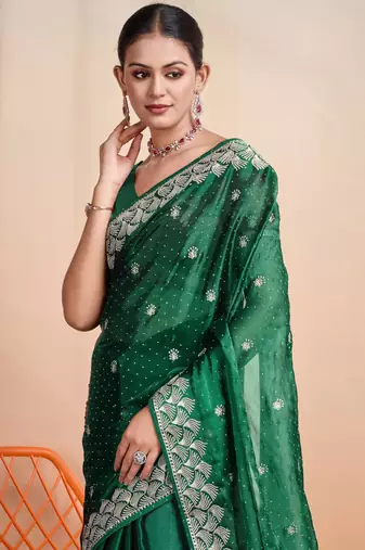 green organza woven saree with unstitched blouse piece