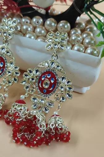   Long earrings with meenakari design and hanging pearls, traditional earrings
