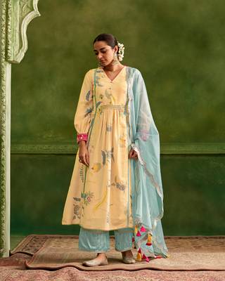 Dresoul yellow embroidered flared kurta set with pink embellished dupatta 1