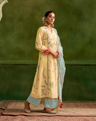 Dresoul yellow embroidered flared kurta set with pink embellished dupatta 2