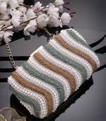 adorn peanut brown, teal green & white wave embellished faux silk clutch
