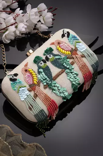adorn off white & multi quirky embellished corduroy clutch
