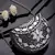 mosaic marble & silver mosaic embellished metal clutch