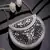 mosaic marble & silver mosaic embellished metal clutch