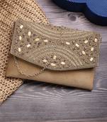 adorn beige & gold embellished suede clutch