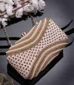 adorn baby pink & gold embellished faux silk clutch