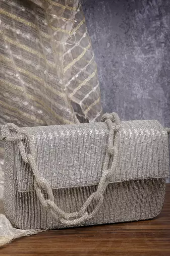 coffer silver striped embellished faux silk clutch