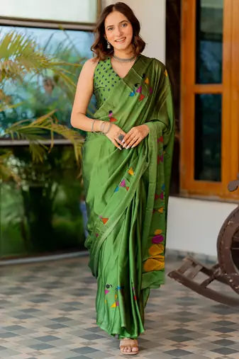 Green chiffon warli print saree with unstitched blouse piece
