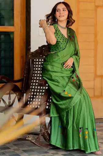 Green chiffon warli print saree with unstitched blouse piece