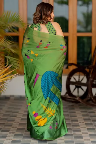 Green chiffon warli print saree with unstitched blouse piece