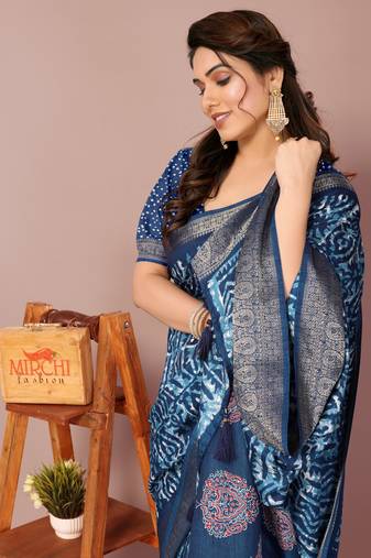Dark rama blue silk blend batik print golden zari woven border saree with unstitched blouse piece