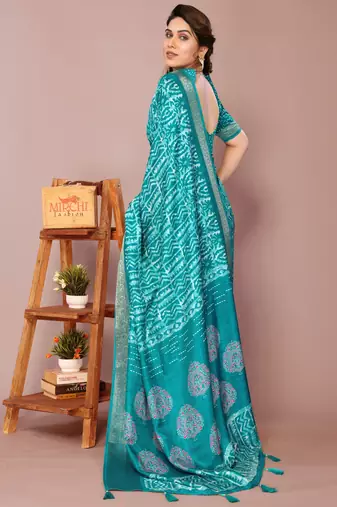 Teal silk blend batik print golden zari woven border saree with unstitched blouse piece