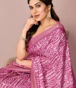 Pink silk blend batik print golden zari woven border saree with unstitched blouse piece