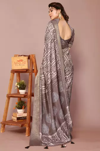 Dark dusty rose pink silk blend batik print golden zari woven border saree with unstitched blouse piece