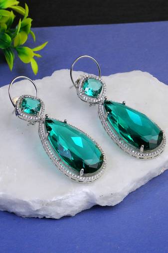 Women rhodium plated green stone studded earrings