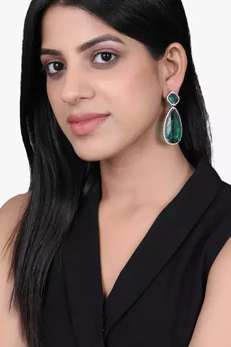 Women rhodium plated green stone studded earrings