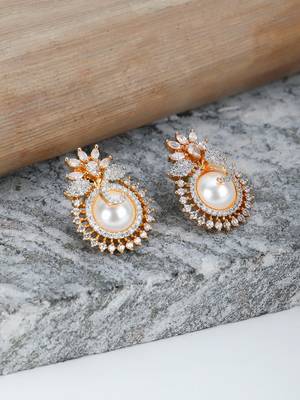 Women gold plated pearl studded studs earrings 1
