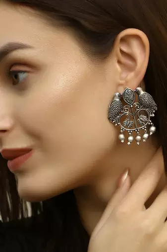 Women parrot design silver plated german earrings