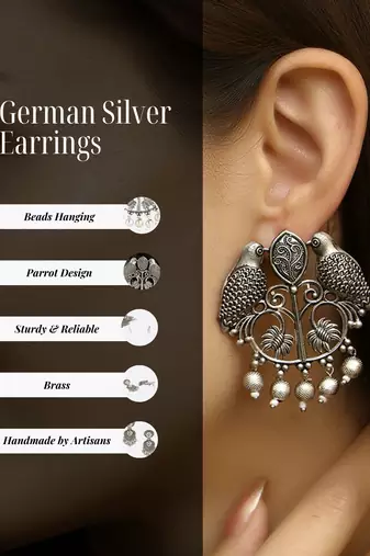 Women parrot design silver plated german earrings