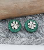 Women flower green stone studded oxidised stud earrings
