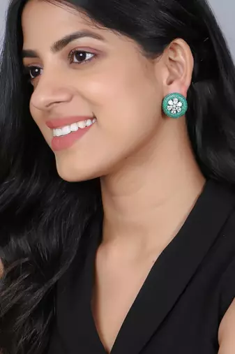 Women flower green stone studded oxidised stud earrings
