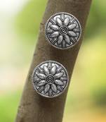 Look like silver circular shaped studs