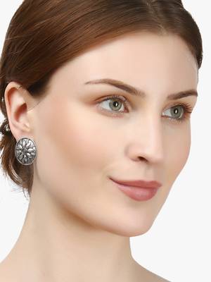 Look like silver circular shaped studs 5