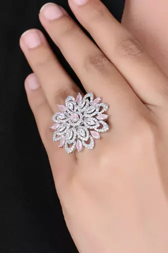 Women rhodium plated stone studded flower shape finger ring