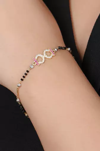 Women gold plated stone-studded traditional mangalsutra bracelet